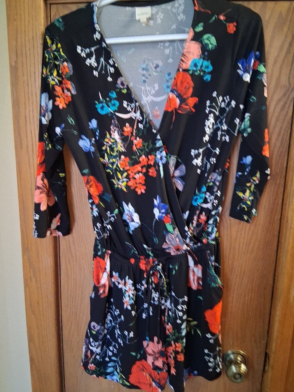 Gorgeous size womens small floral romper. 3/4 sleeve, flattering fabric